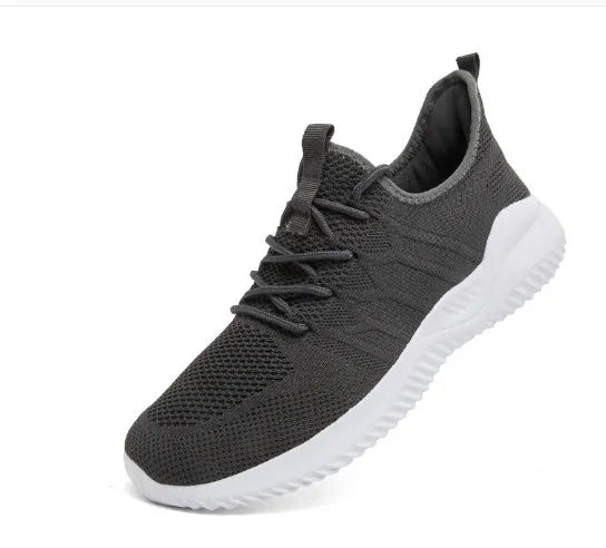 Men's black and white lace-up sneaker with mesh upper and round toe design