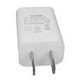Thin white USB wall charger with CE and FCC marks on a plain background.
