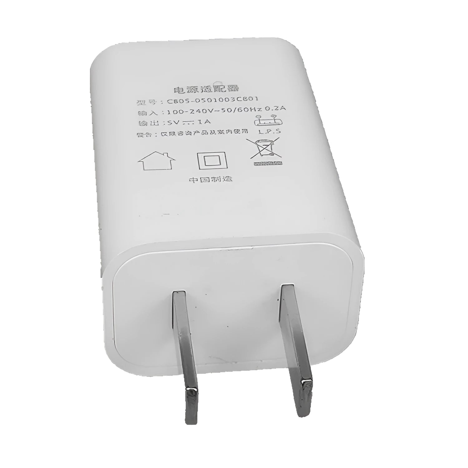 Thin white USB wall charger with CE and FCC marks on a plain background.
