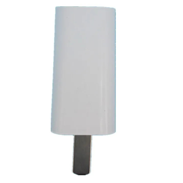 Thin white USB wall charger with CE and FCC marks on a plain background.