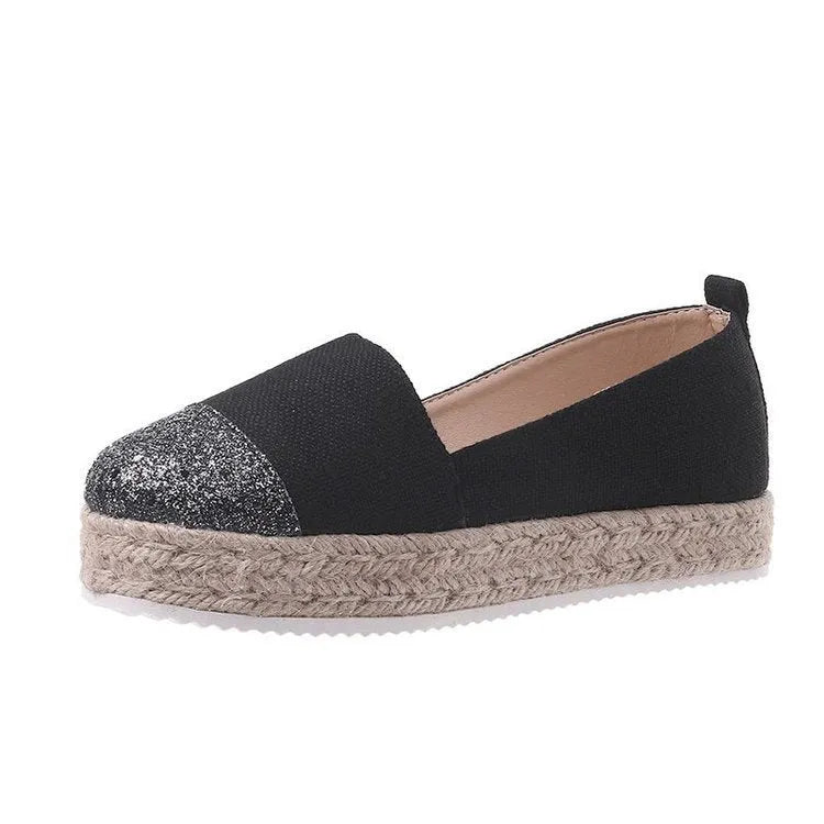 Plus size breathable canvas flat shoes in black and beige with round toe and slip-on design.