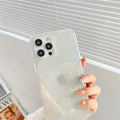 Laser colourful love pattern on a transparent silicone iPhone case for iPhone 13 Pro.