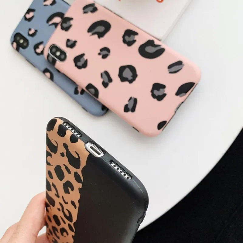 Leopard print iPhone case showing animal pattern design on black background