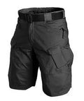 Tactical pants in black with waterproof windproof fabric and multiple pockets for outdoor use