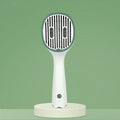 Dark green pet grooming comb with UVC sterilization function and slicker brush needles