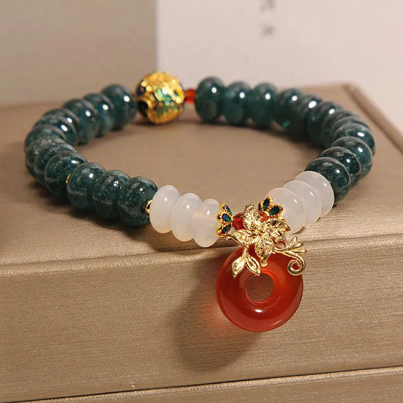 Blue water jade and red agate peace buckle crystal bracelet for women.
