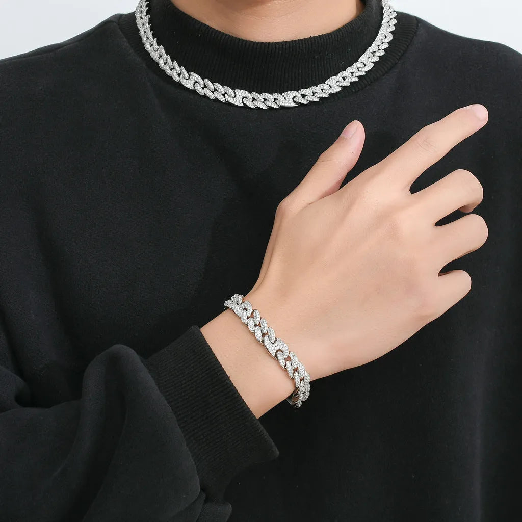 Gold copper Cuban chain bracelet with micro inlaid zircon on a surface