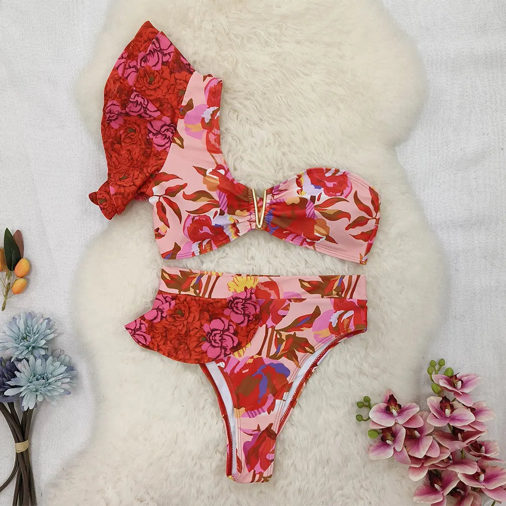 Women's one-shoulder pink floral high-waist bikini swimsuit with ruffled detailing