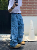 Men's blue straight-leg denim jeans with mid-waist and zip fly