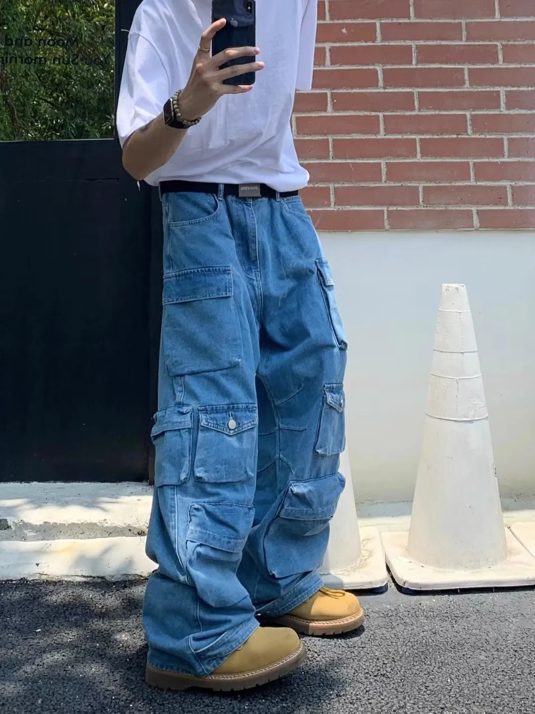 Men's blue straight-leg denim jeans with mid-waist and zip fly
