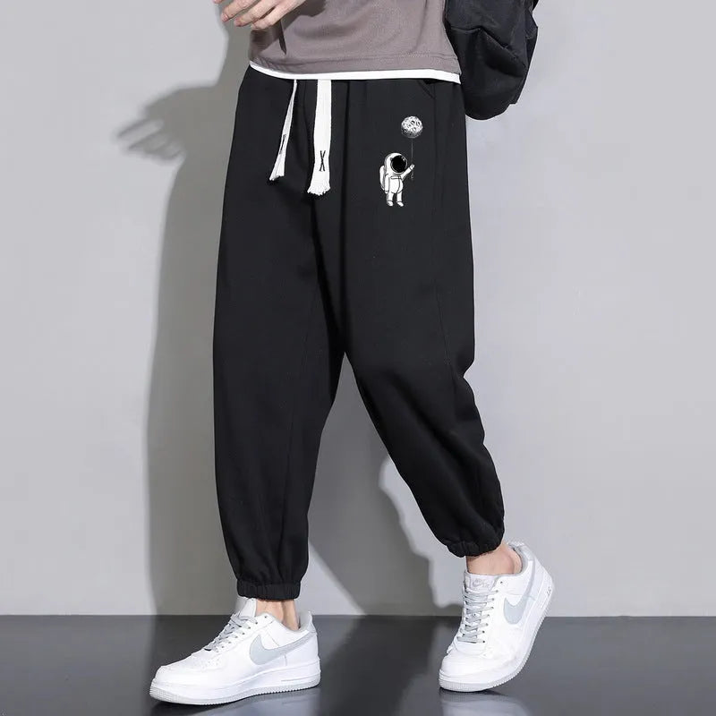 Cropped casual loose men's long pants in 100% polyester, tapered leg, mid waist, available in multiple colours