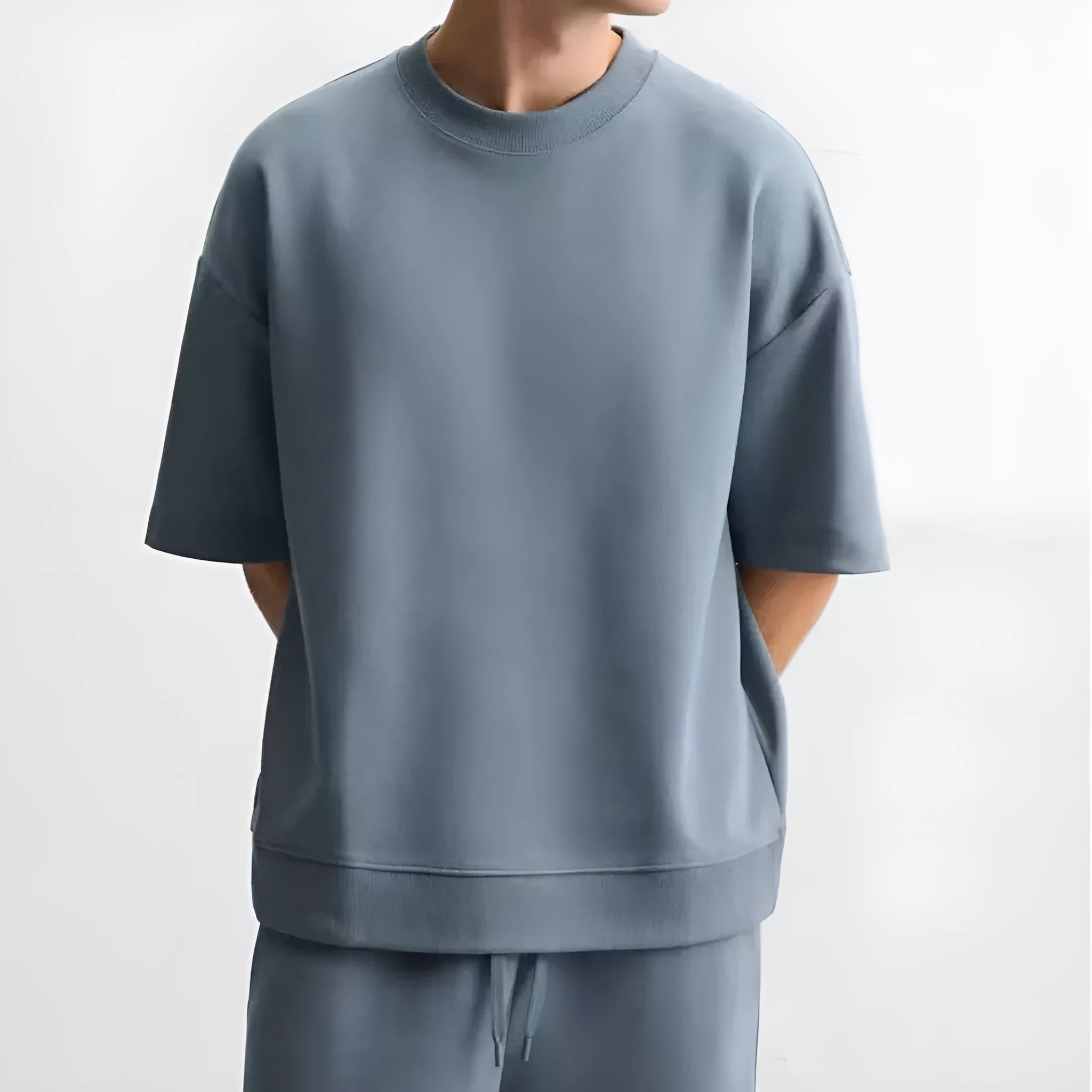 Loose double-sided texture polyester short sleeve top and matching shorts set on a hanger