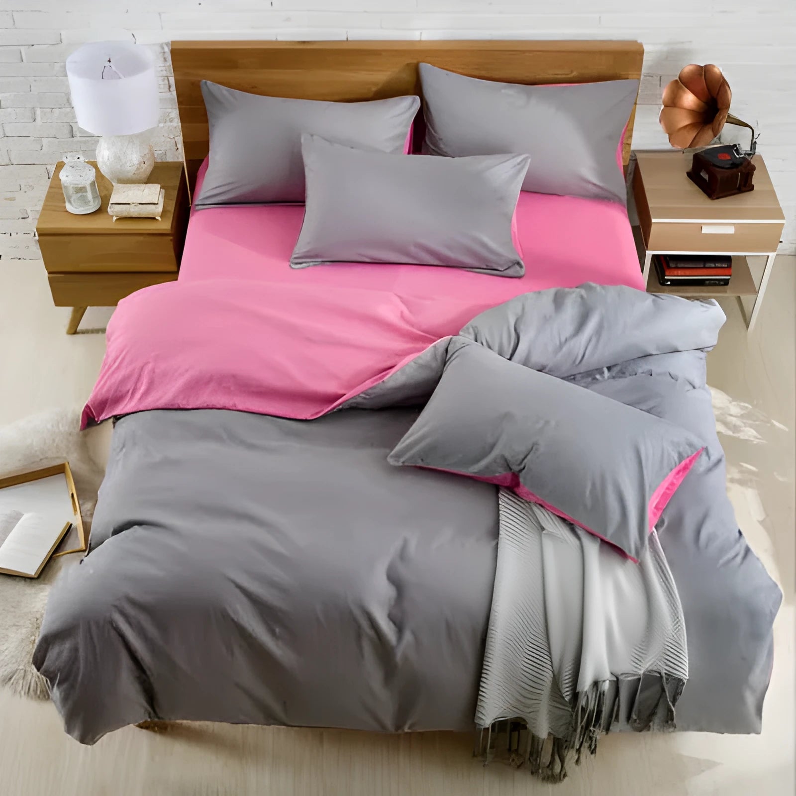 Brushed plain bedding set in brick red colour with duvet cover, sheet and pillowcase on a bed