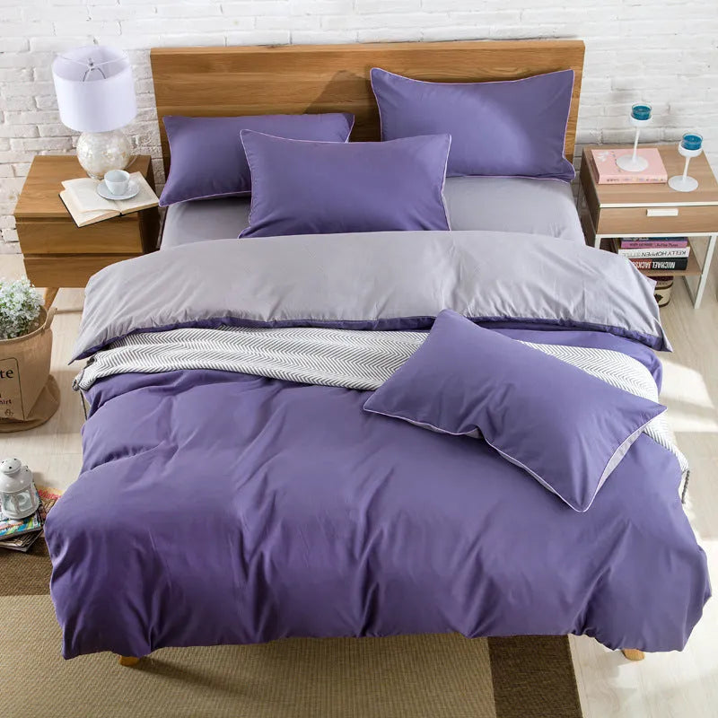 Brushed plain bedding set in brick red colour with duvet cover, sheet and pillowcase on a bed