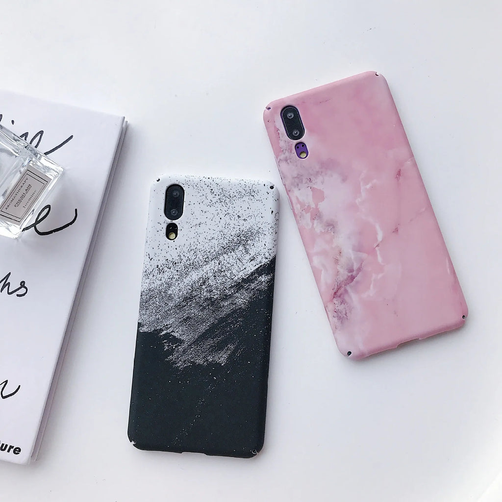 Solid colour painted phone case for Huawei and Honor smartphones in black and pink options.