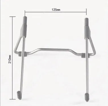 Grey aluminium mobile phone and laptop stand with adjustable tilt angle on a desk