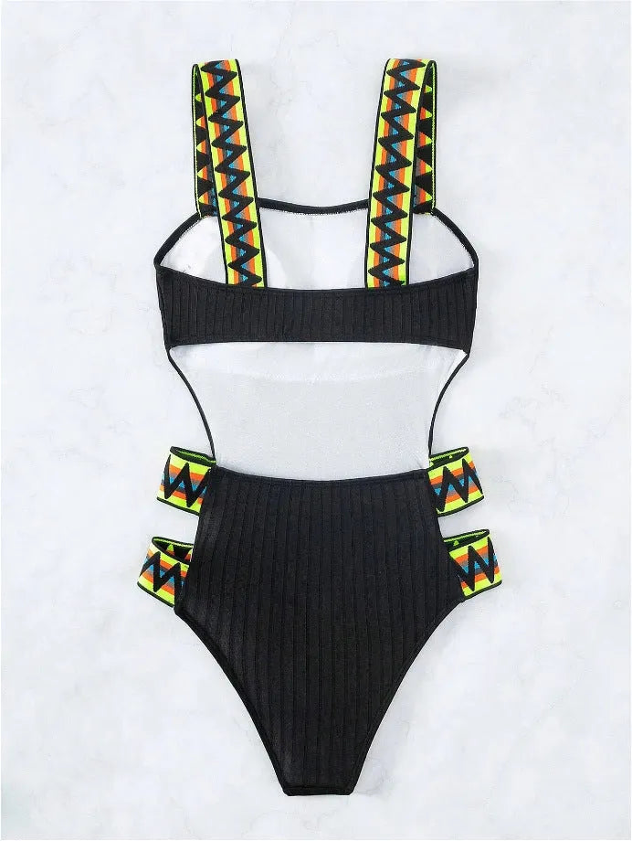 Black one-piece scoop-back women's swimsuit made from durable polyester fabric on a mannequin.
