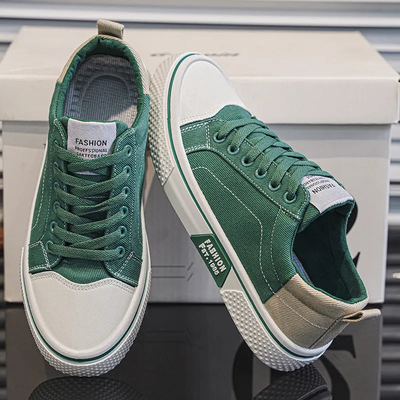Men's low-top casual canvas shoes in blue with round toe and lace-up front for skateboarding