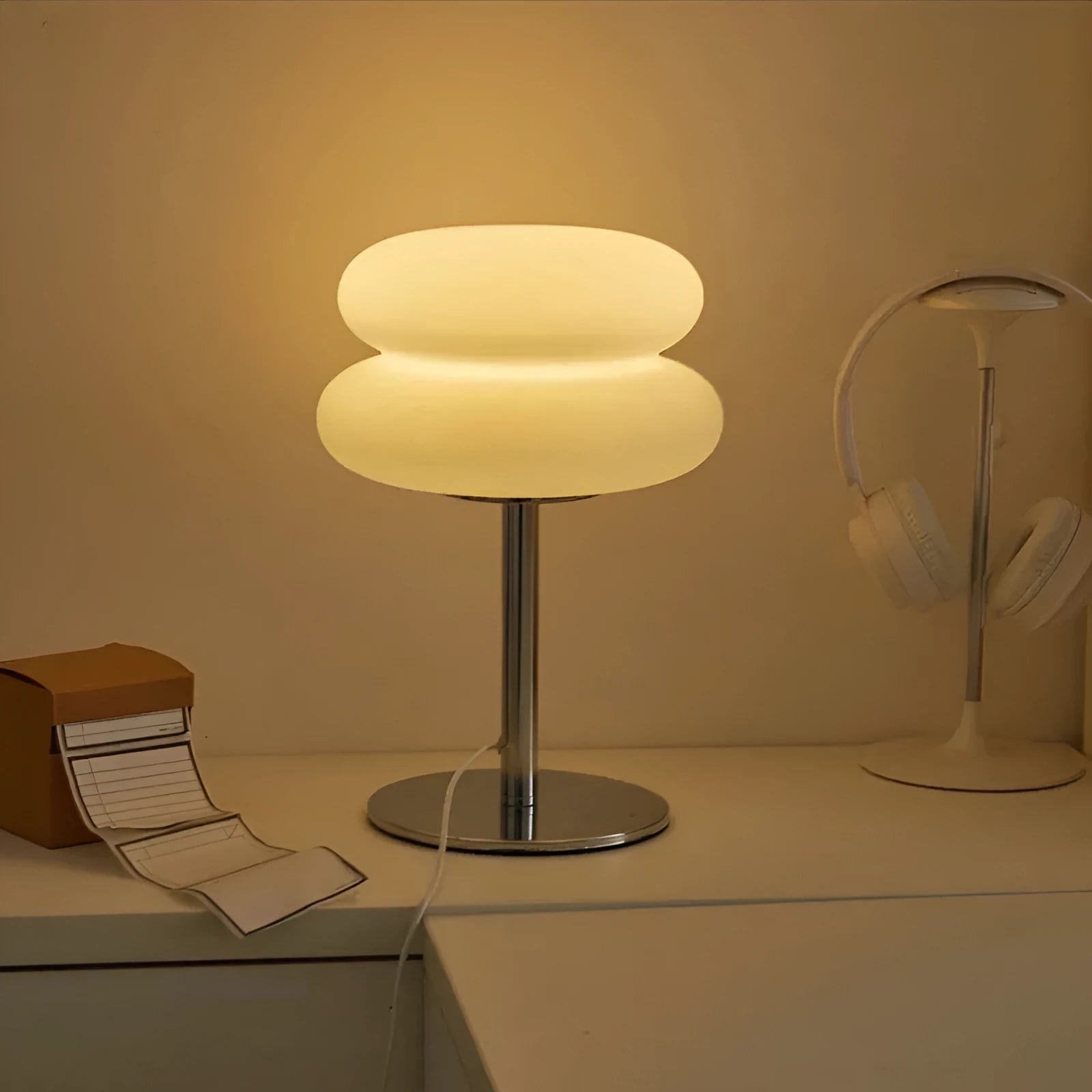 Desktop small table lamp with glass lampshade and USB plug-in tri-colour lighting on a wooden desk