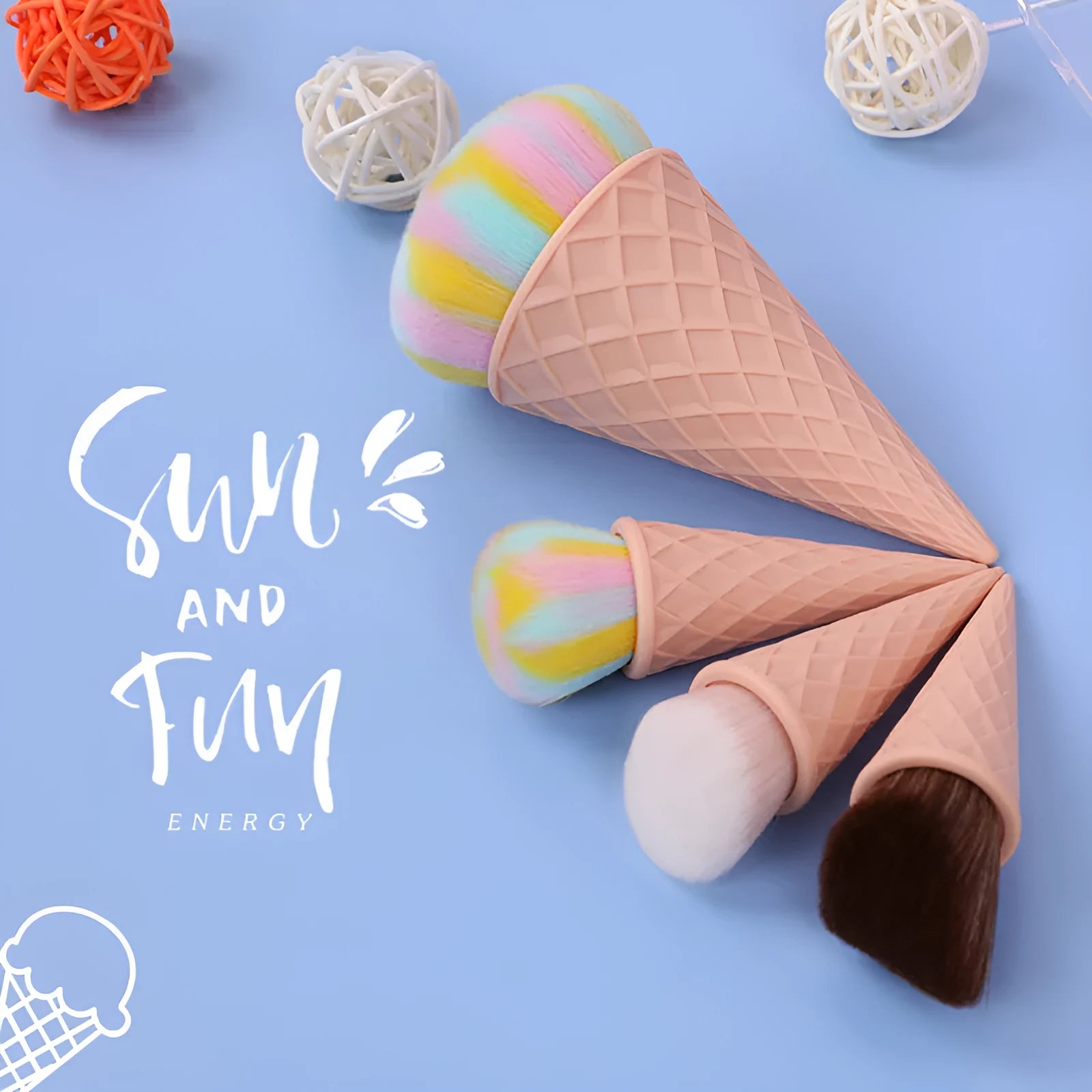 Set of 4 ice cream themed makeup brushes with artificial fibre bristles and plastic handles in paper box