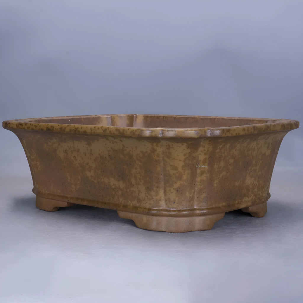 Large rectangular purple sand flowerpot with segment design and double-pump mechanism on floor.