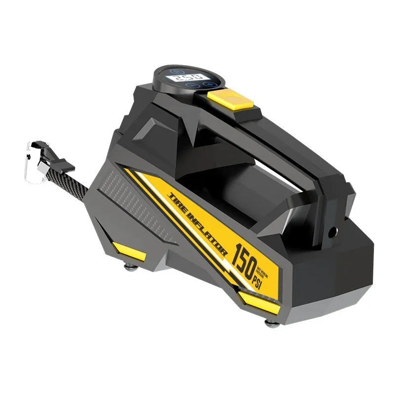 Black portable 12V tyre inflator with digital display and power cable on a garage floor