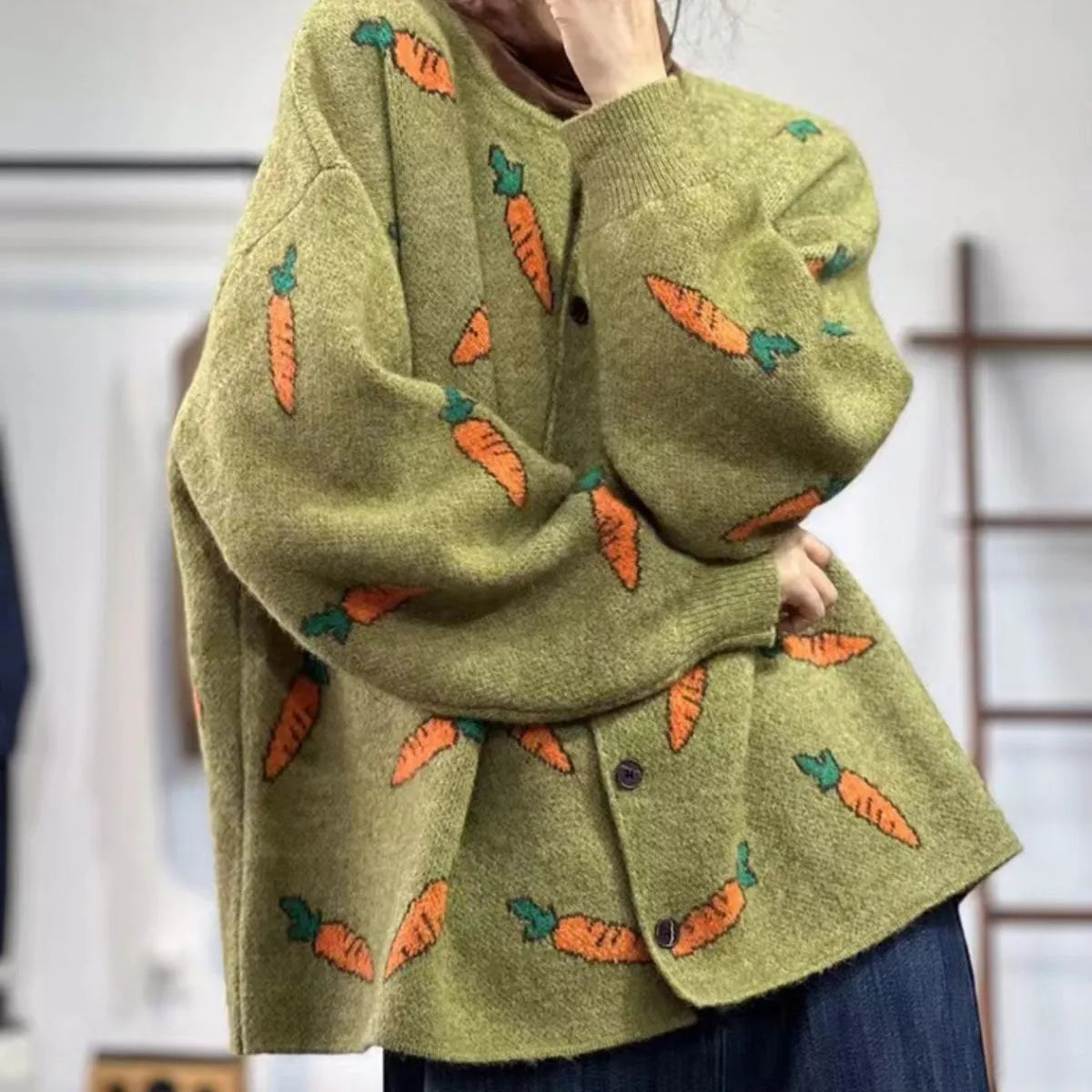 Grey loose cardigan with colourful Mori artistic printing and a round neck.
