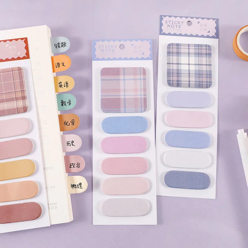 Set of six colourful memo pads with sticky notes, showing plaid and solid colour designs like Spring Garden and Twilight Coast.