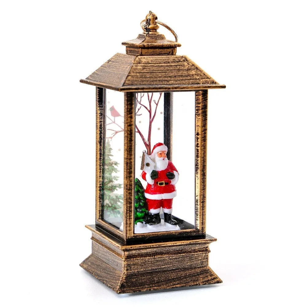 Christmas portable oil lamp with Santa Claus LED design in gold colour on white background