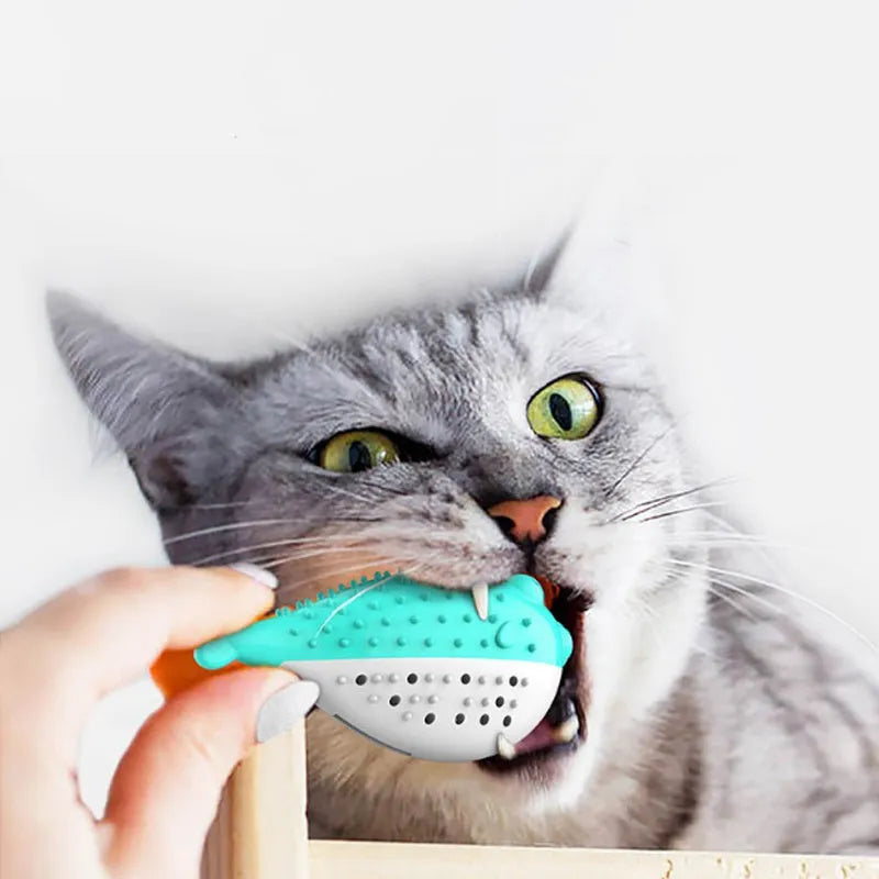 Silicone fish-shaped cat chew toy with toothbrush cleaner design in assorted colours