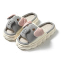 Elephant grey linen open toe slippers for couples with PVC soles on wooden floor