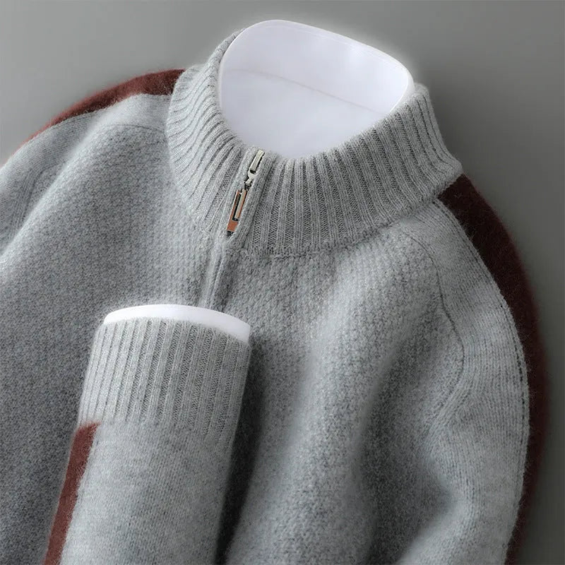 Sheep wool half-zip knitted pullover sweater in slim fit on a hanger.