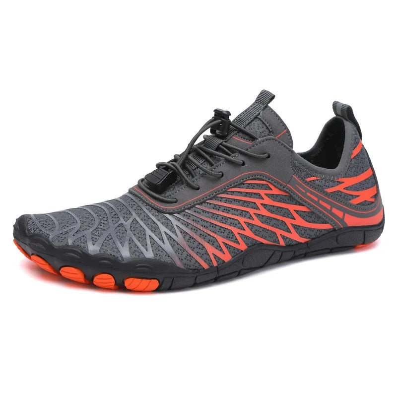 White and pink lace-up upstream sports shoes with a rubber sole on a neutral background.