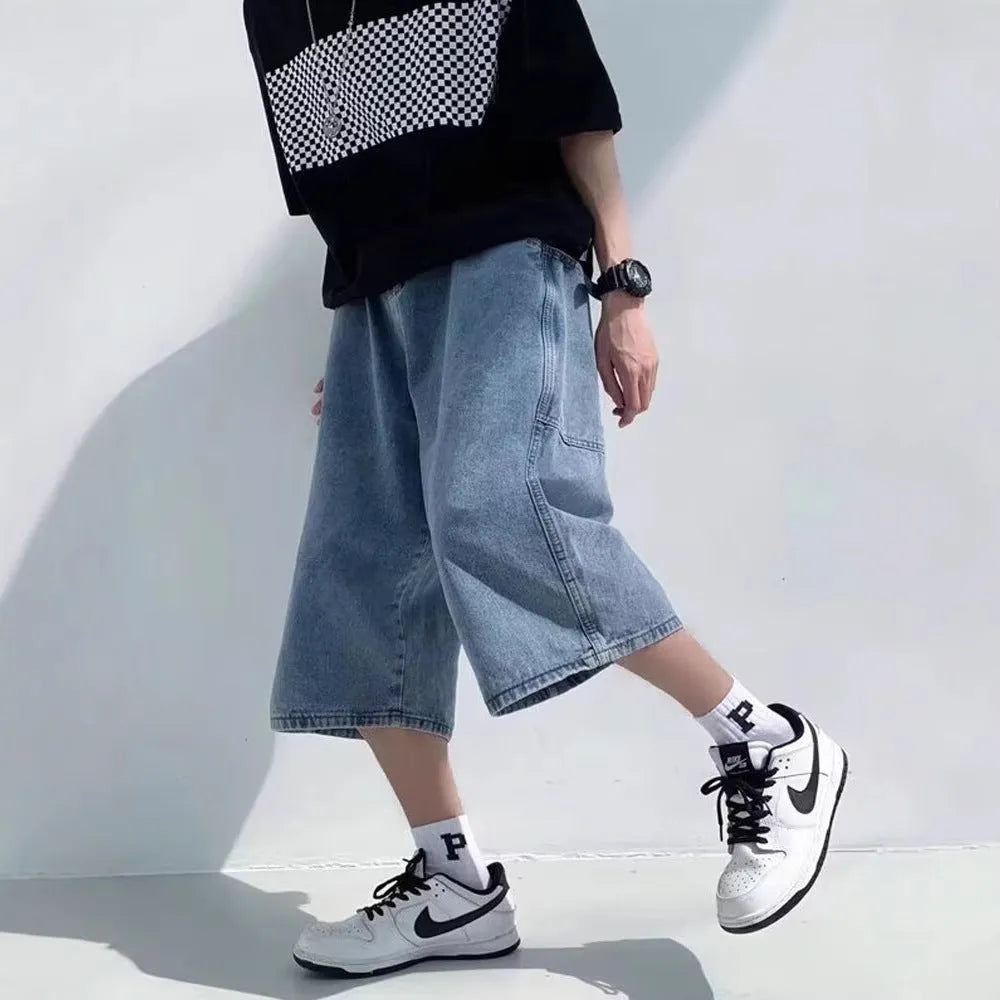 Blue men's thin denim pirate shorts with a high waist and cropped straight-leg fit.