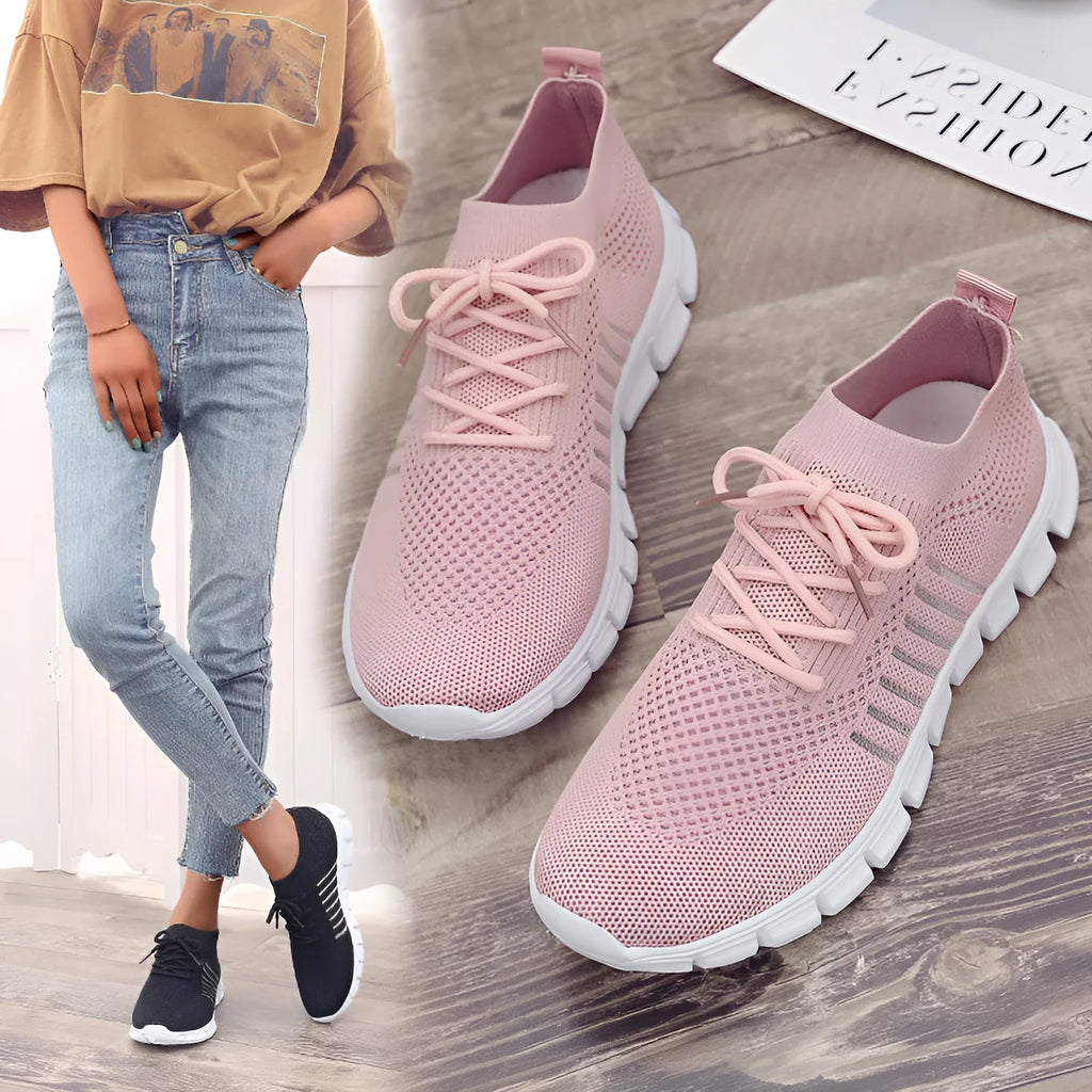 Beige ladies flying knit flat shoes with mesh upper, round toe, and low heel on a plain background
