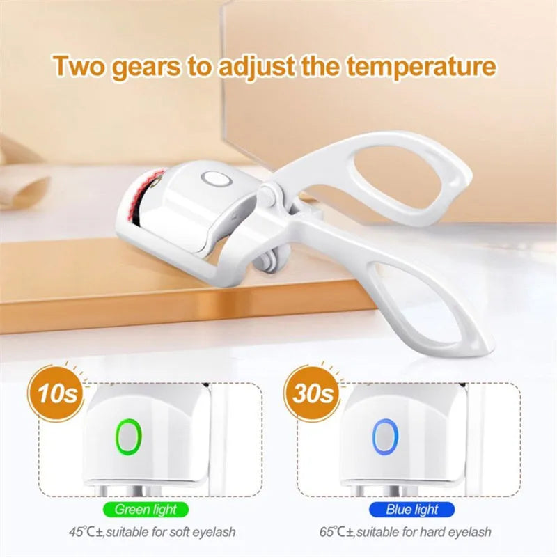 Pink and white USB rechargeable heated eyelash curler with dual temperature settings.