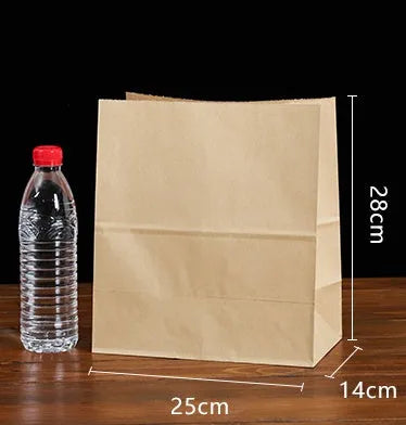 Yellow kraft paper tin foil bag with inner aluminium layer for snack food packaging.