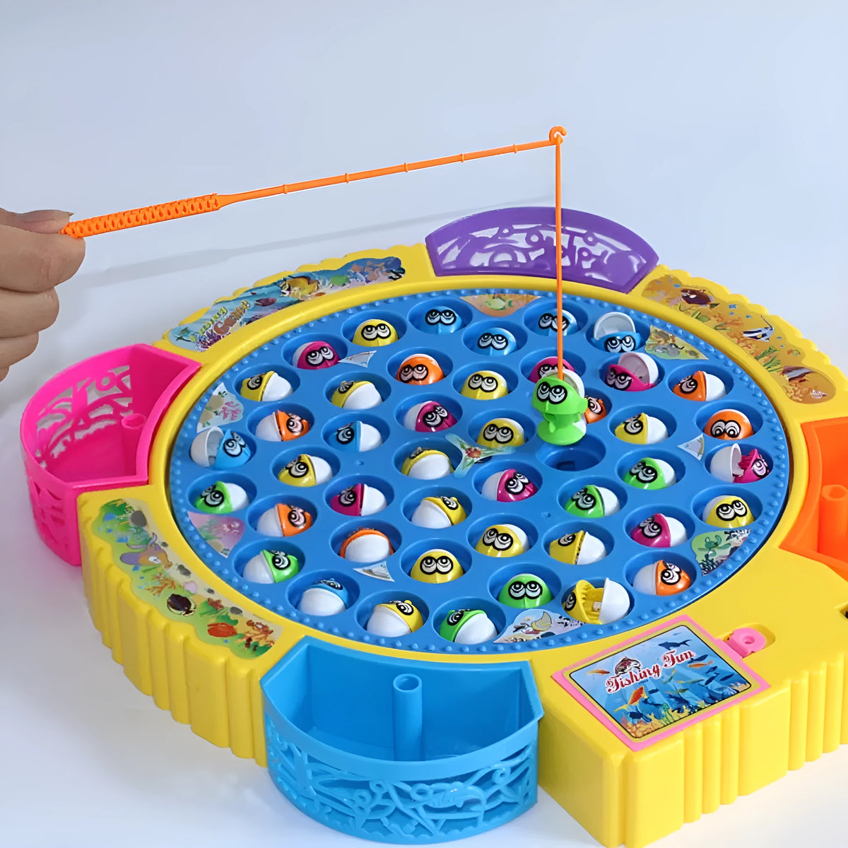 Children's plastic electric rotating fishing machine toy with 24 fish pieces and fishing rod