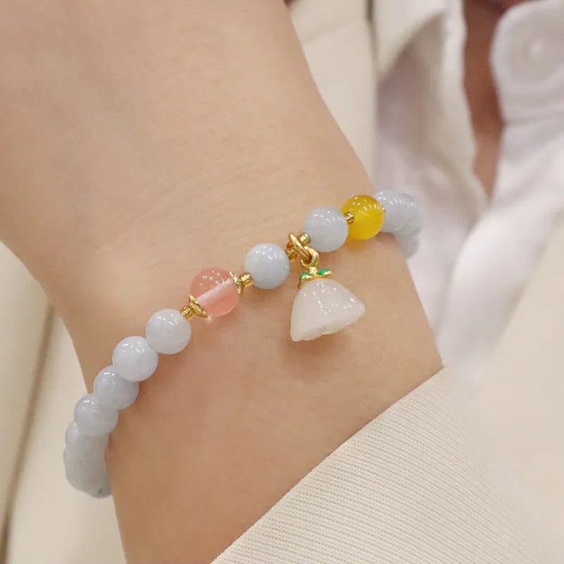 Aquamarine crystal bracelet with gold plated charm pendant for women
