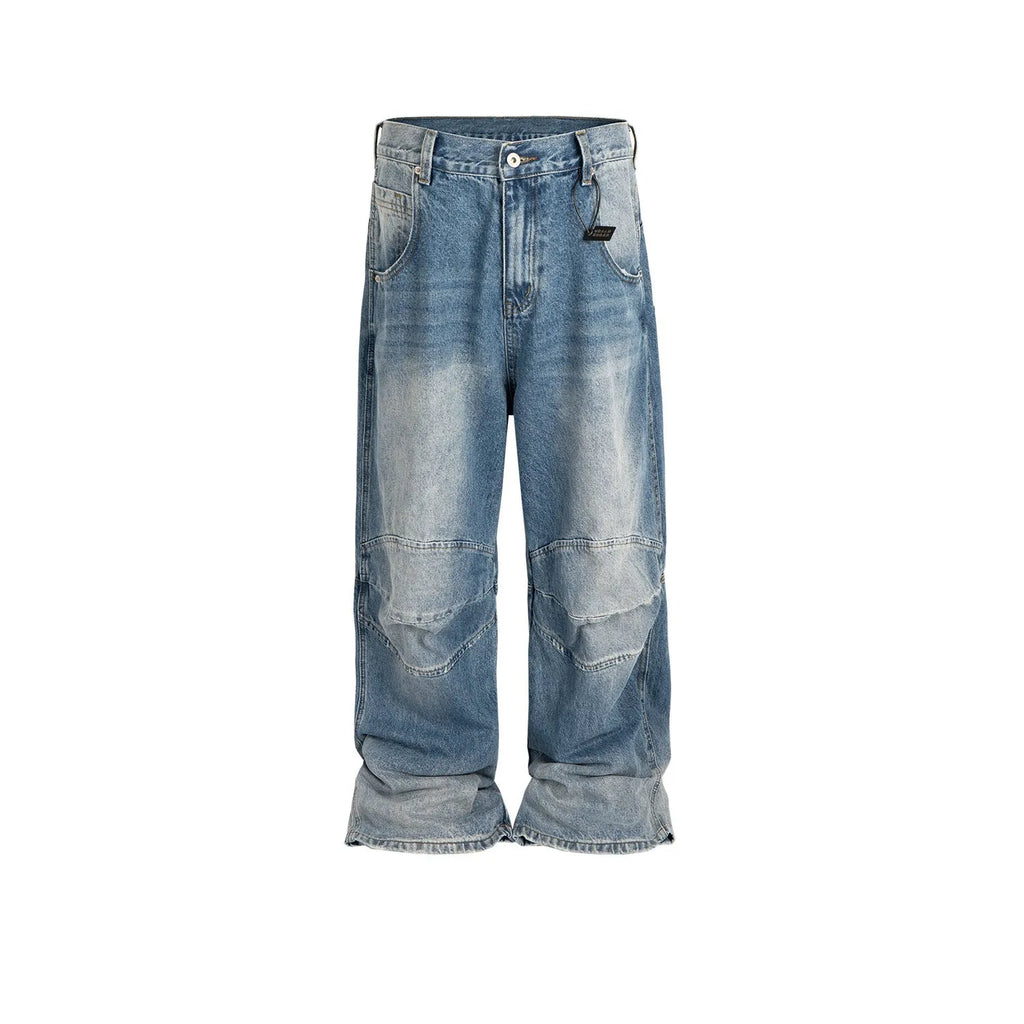 Men's washed light blue baggy jeans with a straight-leg cut and zip fly.