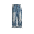 Men's washed light blue baggy jeans with a straight-leg cut and zip fly.
