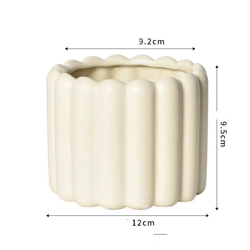 Roman column matte yellow ceramic flower pot with breathable, self-absorbent design for indoor plants