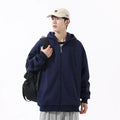 Loose hooded cardigan for teenagers in solid black, unlined polyester fibre, relaxed fit, front view
