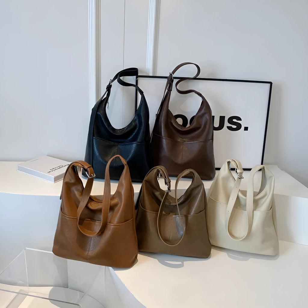 Women's large-capacity soft PVC shoulder bag bucket shape with stitching in beige white colour