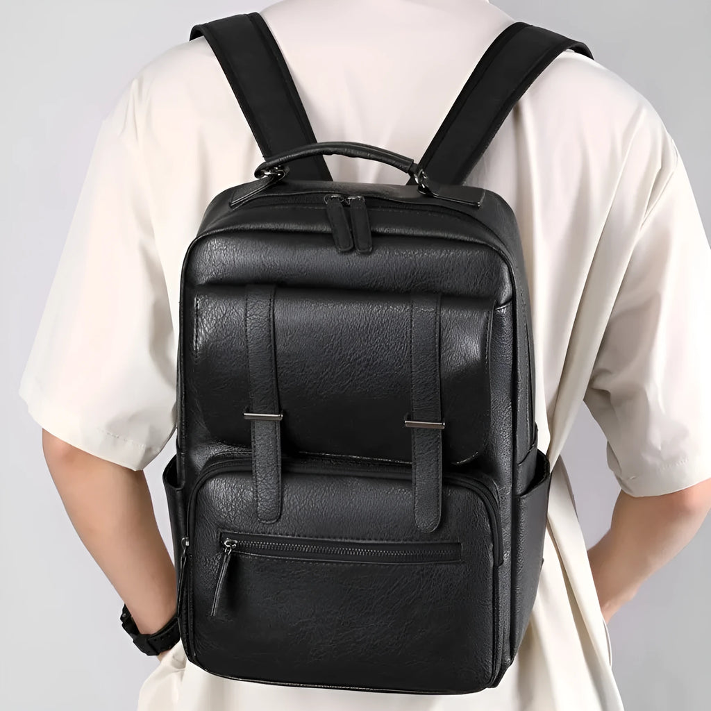 Waterproof PU leather backpack in amber brown, cool black or khaki, 40x28x18cm, with air pillow belt