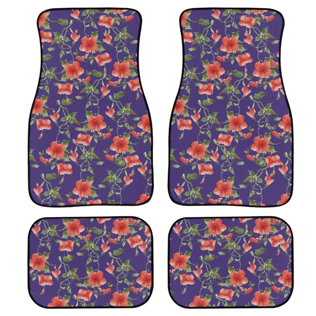 Black universal fit rubber car floor mats set of four with textured surface, shown in a vehicle footwell.