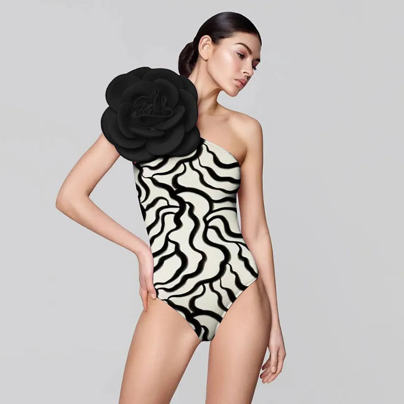 Women's solid colour one-piece swimsuit with European fit in a floral pattern design.