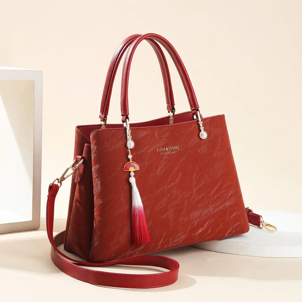 Women's PU shoulder bag in horizontal square shape with slit pocket, available in beige, black, green or red ethnic colours