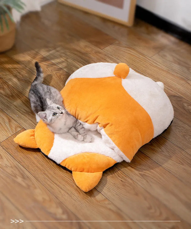 Orange semi-closed cat sleeping bag bed measuring 65 cm by 53 cm