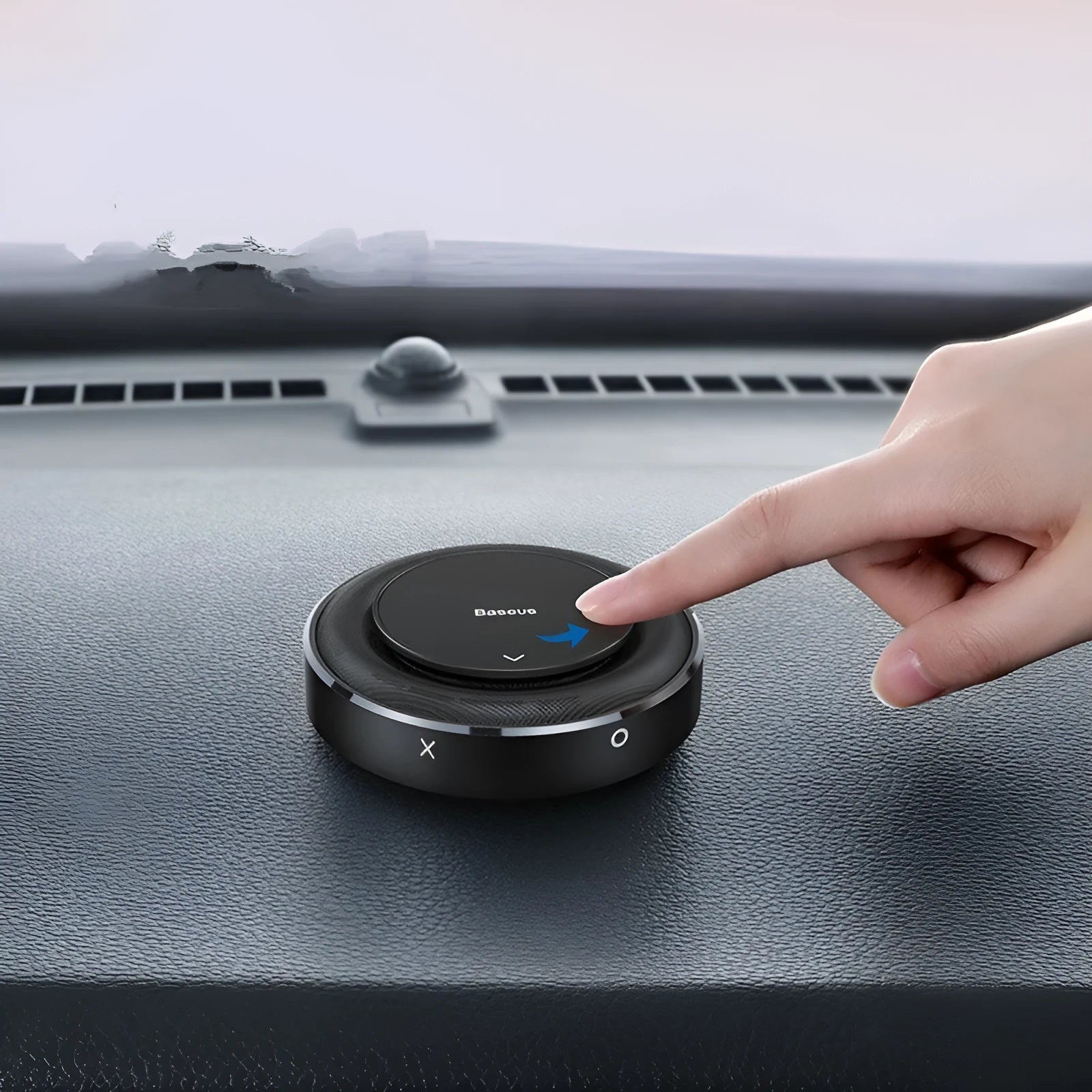 Black aluminium alloy round car perfume seat with aromatherapy tablets on a car seat.